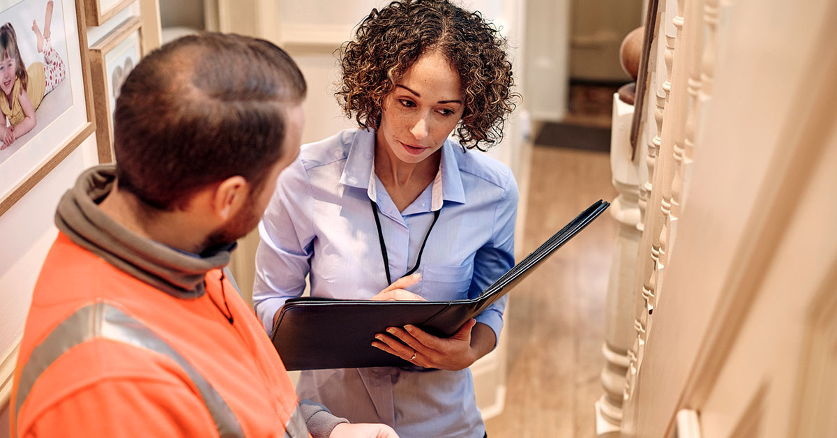 an appraiser appraising a home