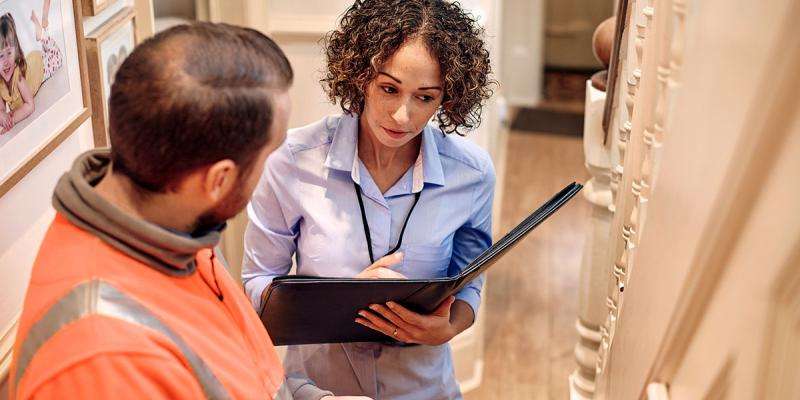 an appraiser appraising a home